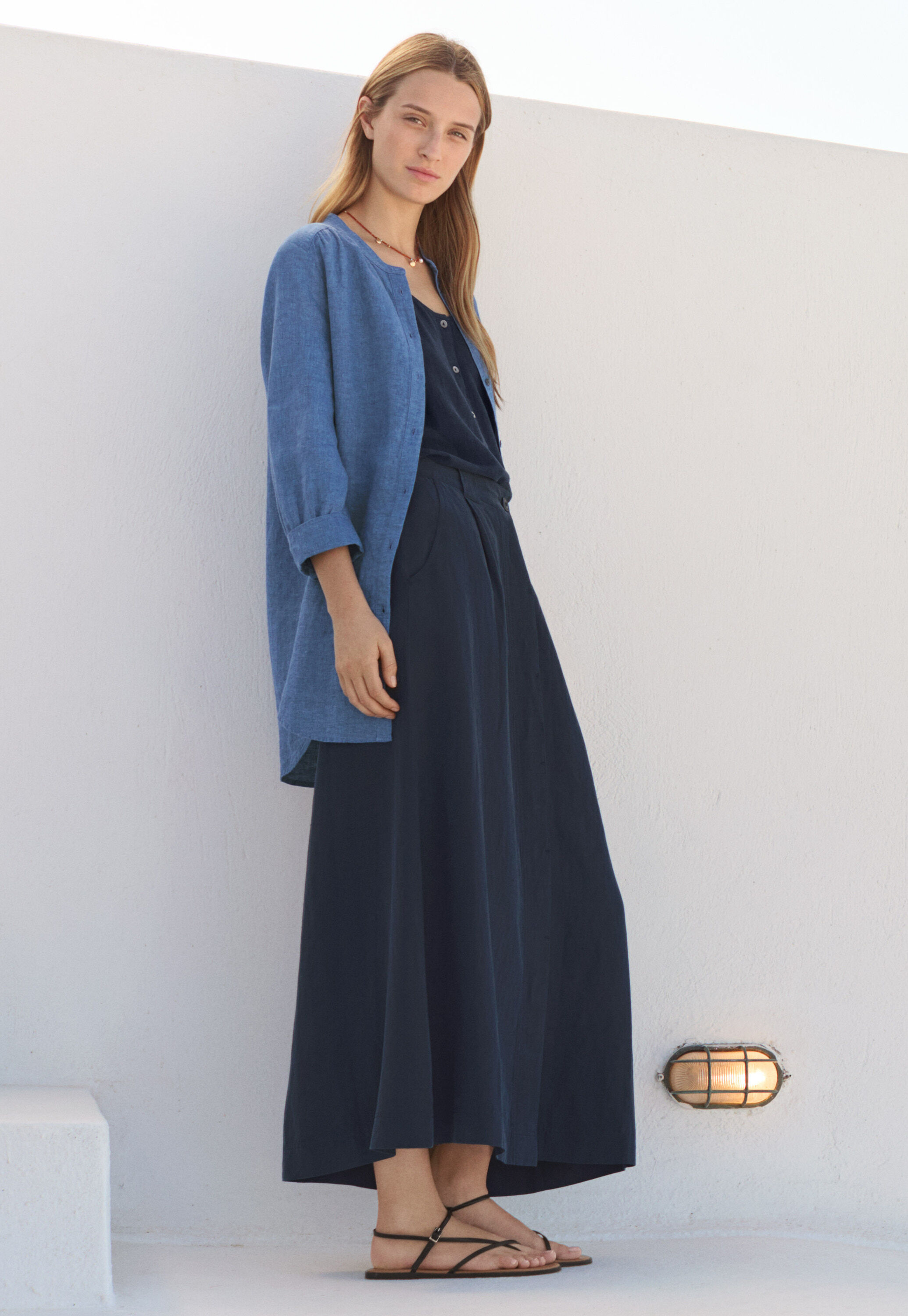 Lange Bluse mit geschwungenem Saum