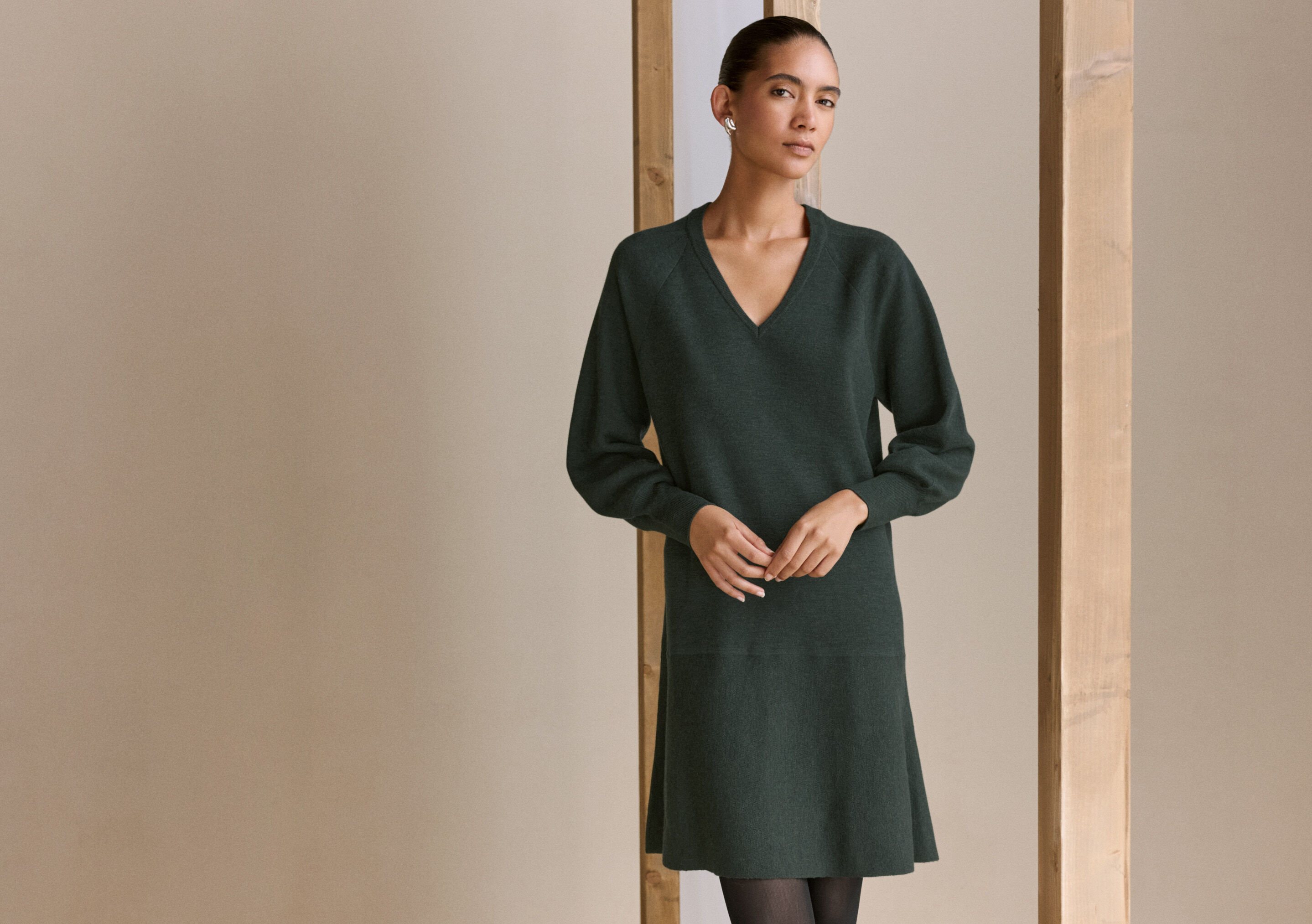 Kleid mit Peplum-Saum
