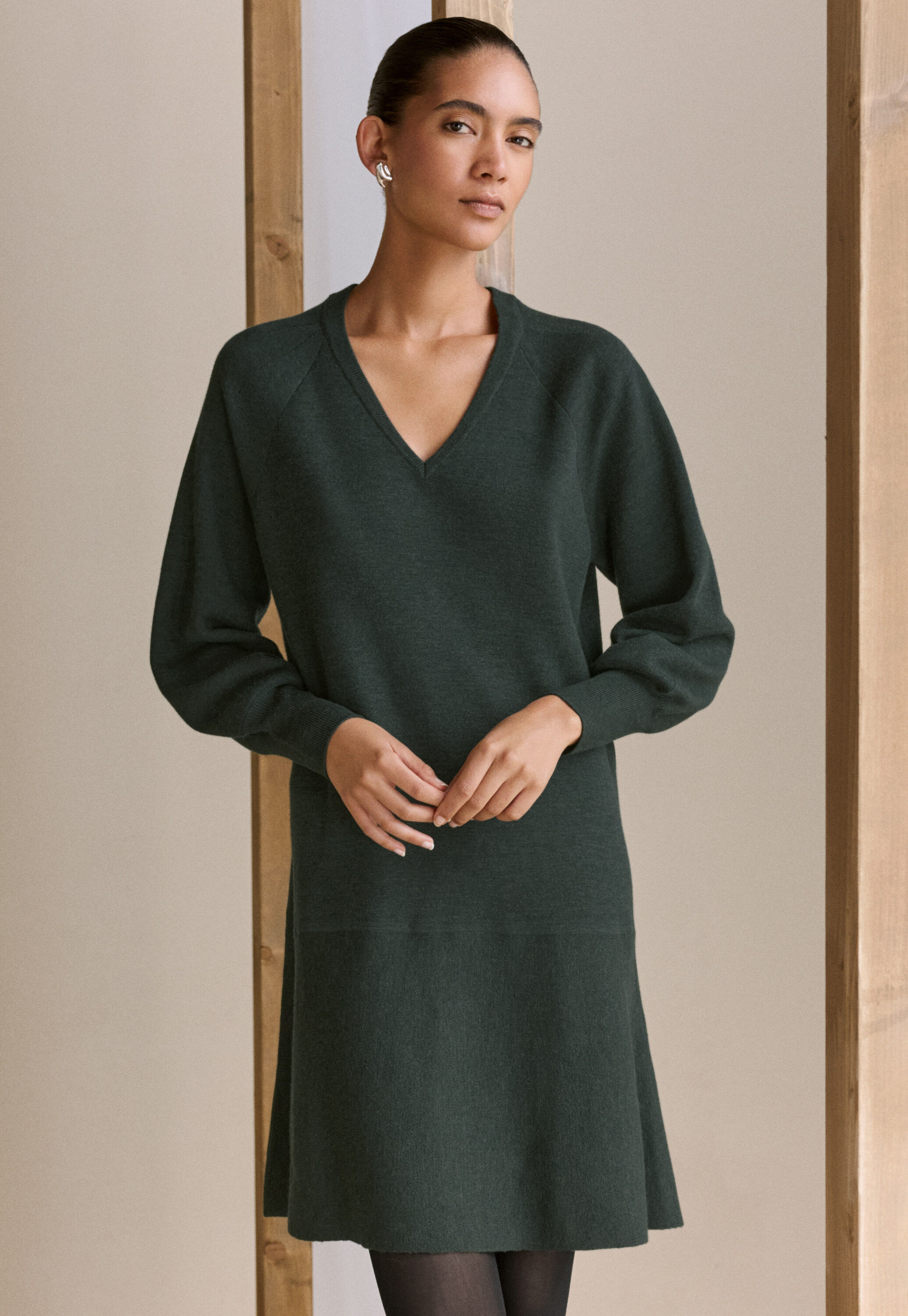 Kleid mit Peplum-Saum