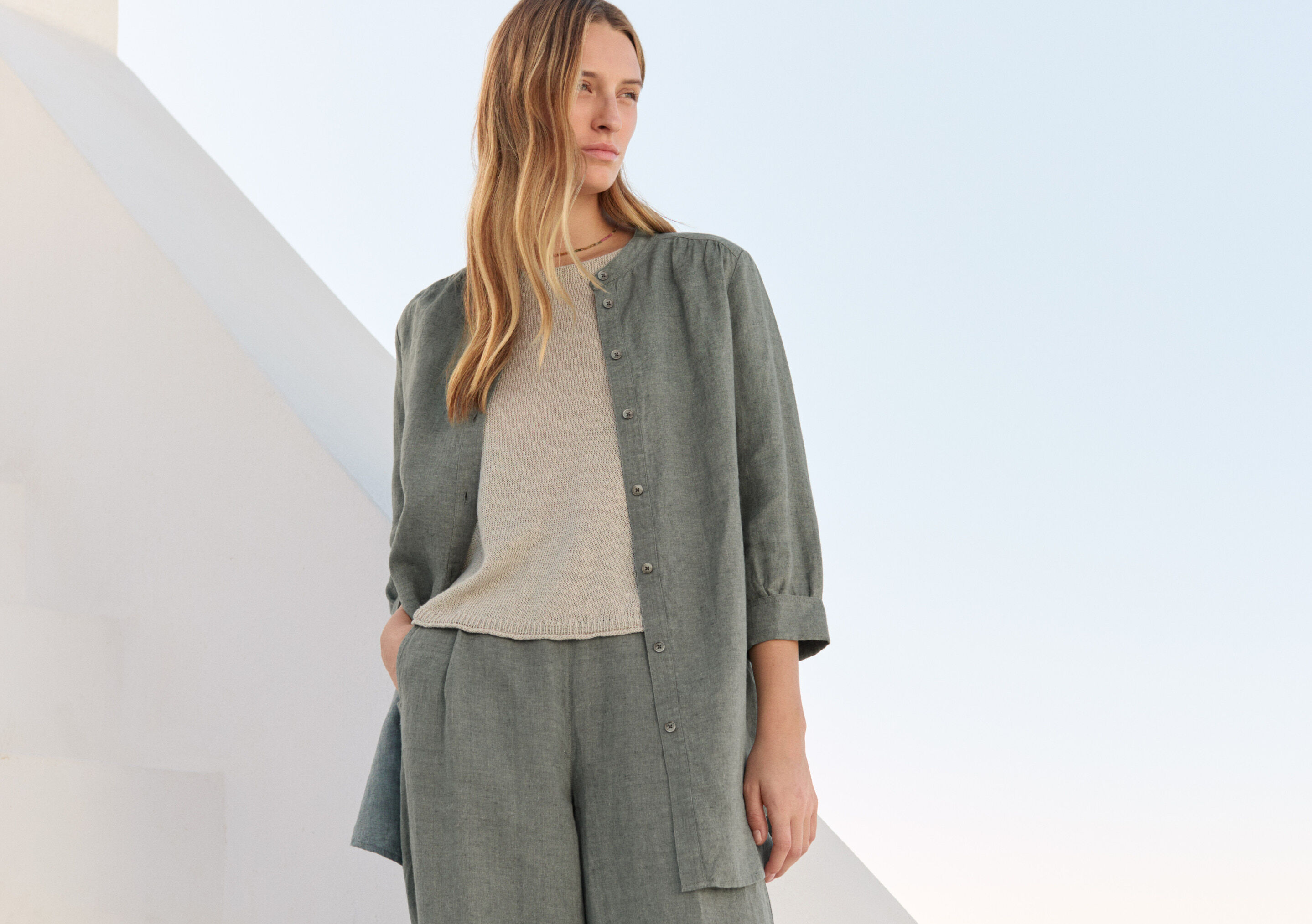 Lange Bluse mit geschwungenem Saum