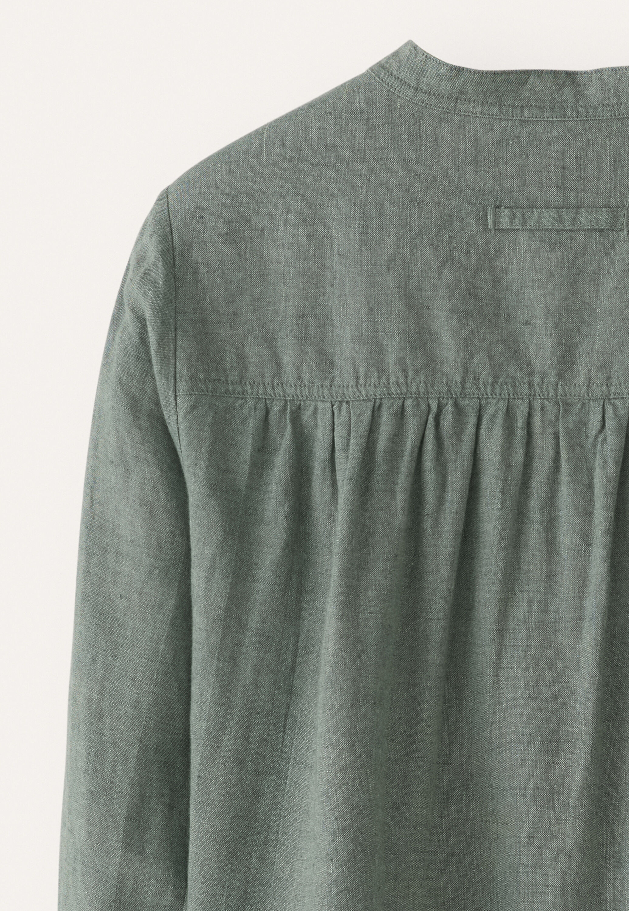 Lange Bluse mit geschwungenem Saum